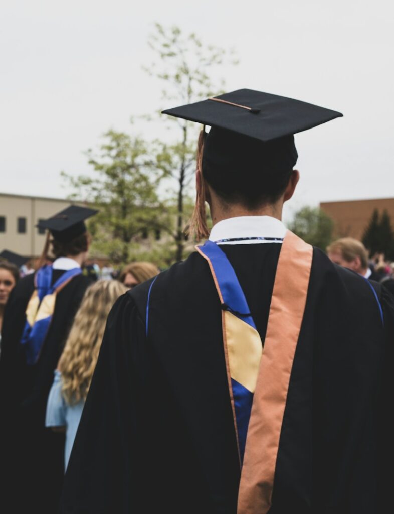 man wearing academic gown